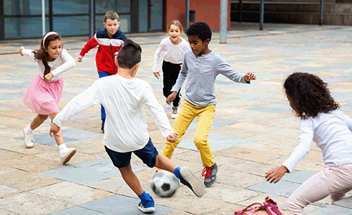 Children playing soccer