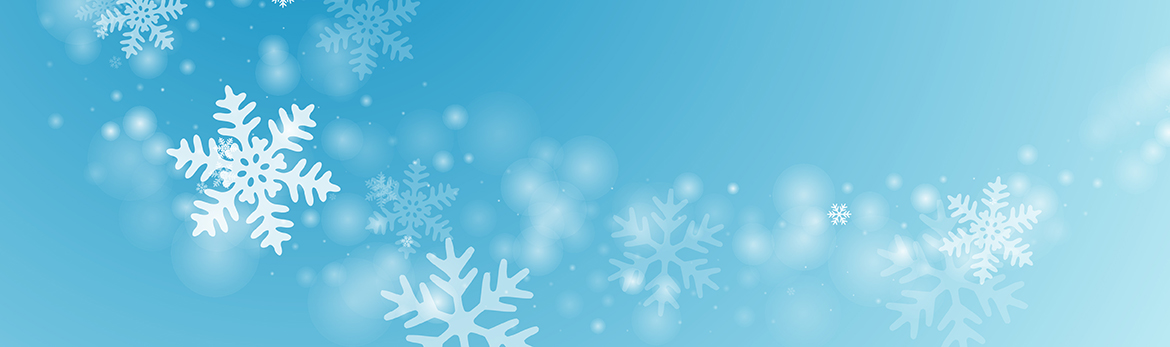 Snowflakes flying in the air on a blue background